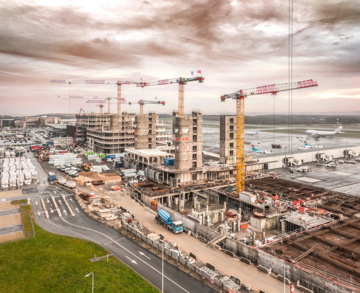 /storage/2023/04/liebherr-cranes-build-sustainable-office-building-at-luxembourg-airport_643bc0ff957b0.jpg