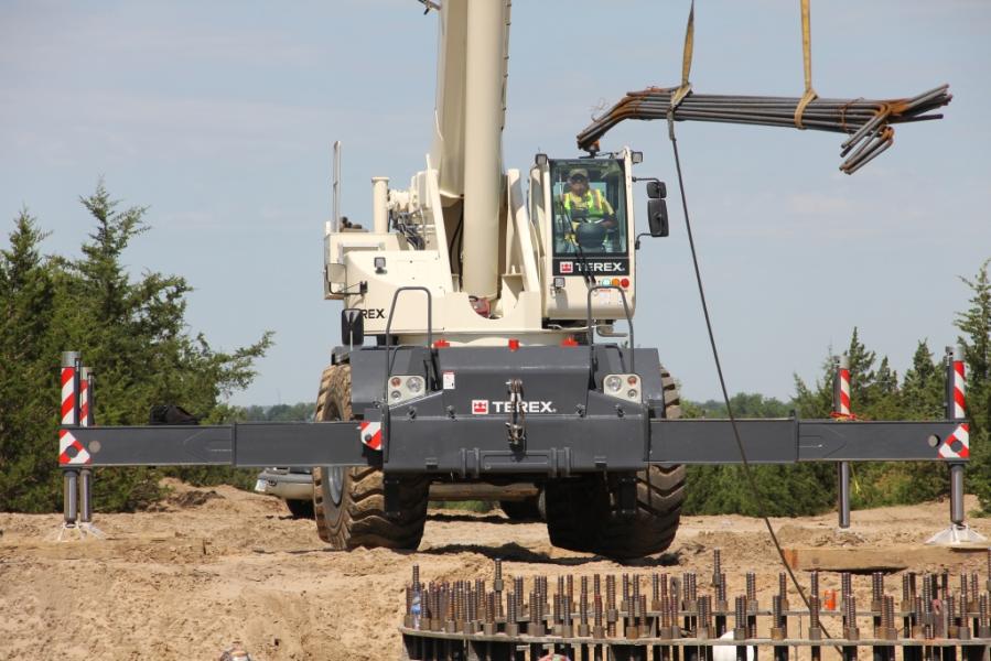 The new 100-U.S.-ton class Terex RT 100US outlifts 130-u.s.-ton crane on wind turbine pedestal base construction project 