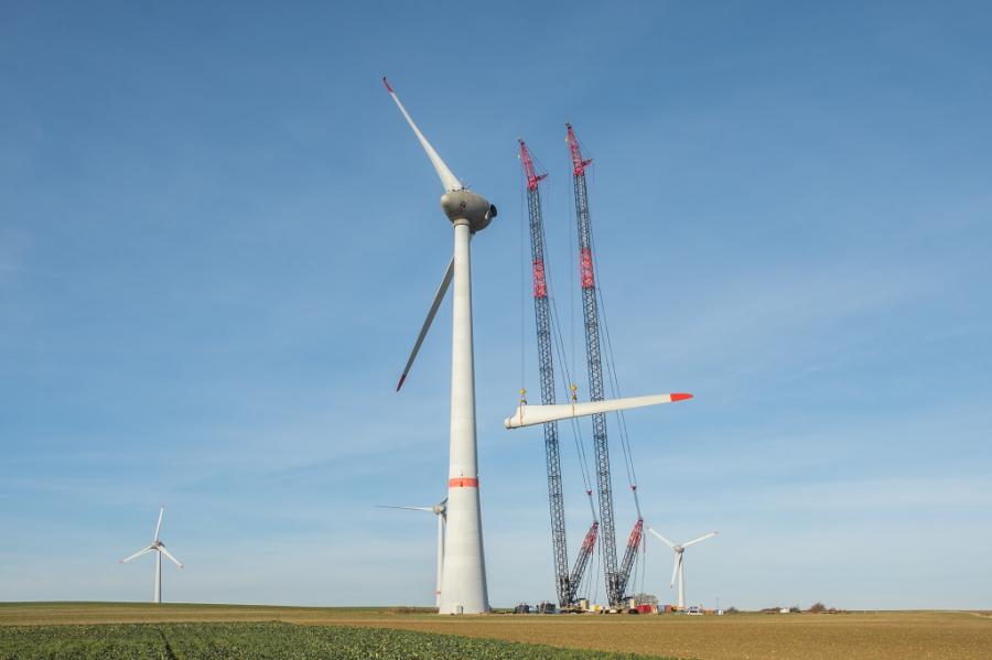 CC 3800 Crawler Cranes remove rotor blades from Enercon E-126 wind turbine using tandem lifts